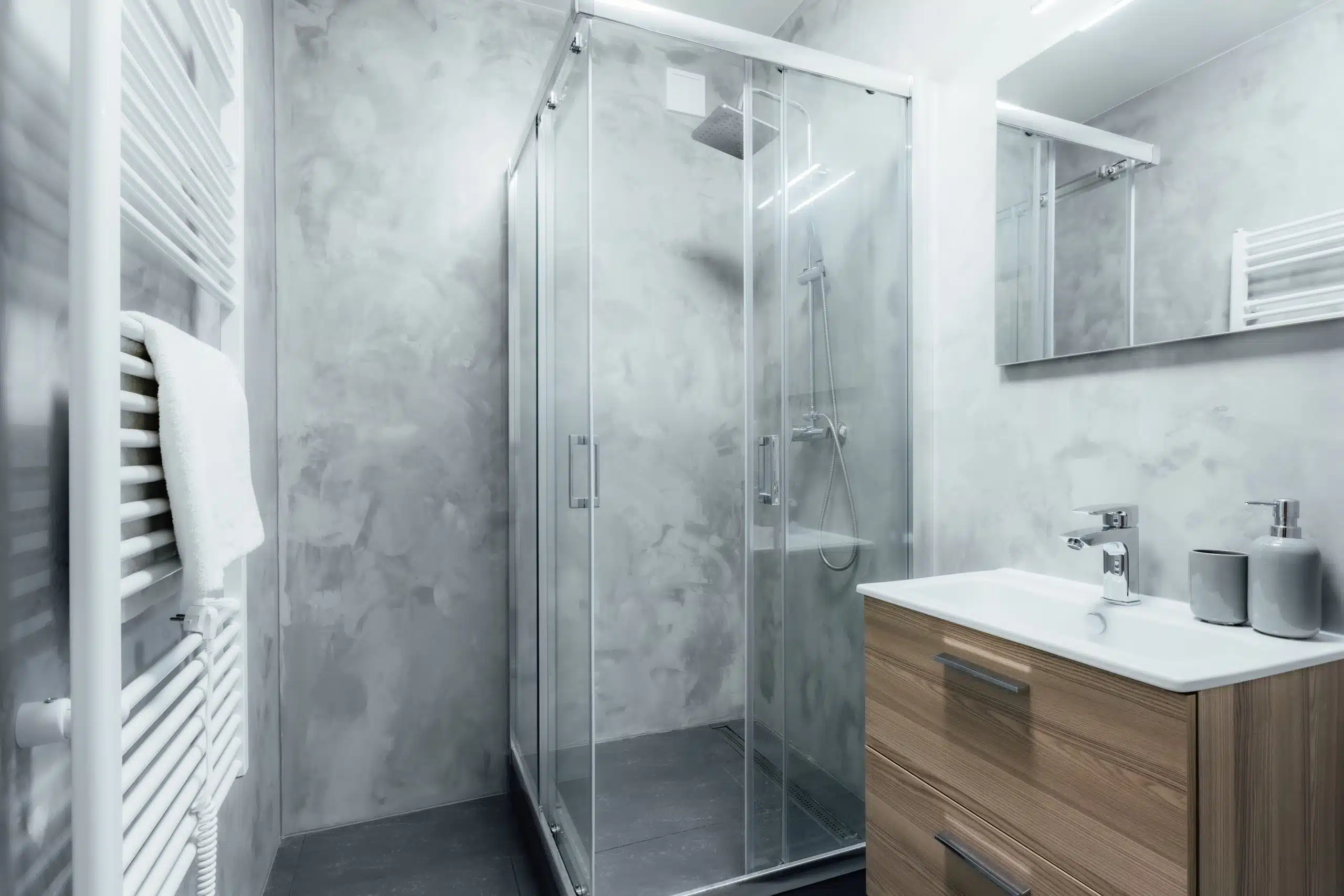 Contemporary bathroom with shower and sink with wooden cabinet u