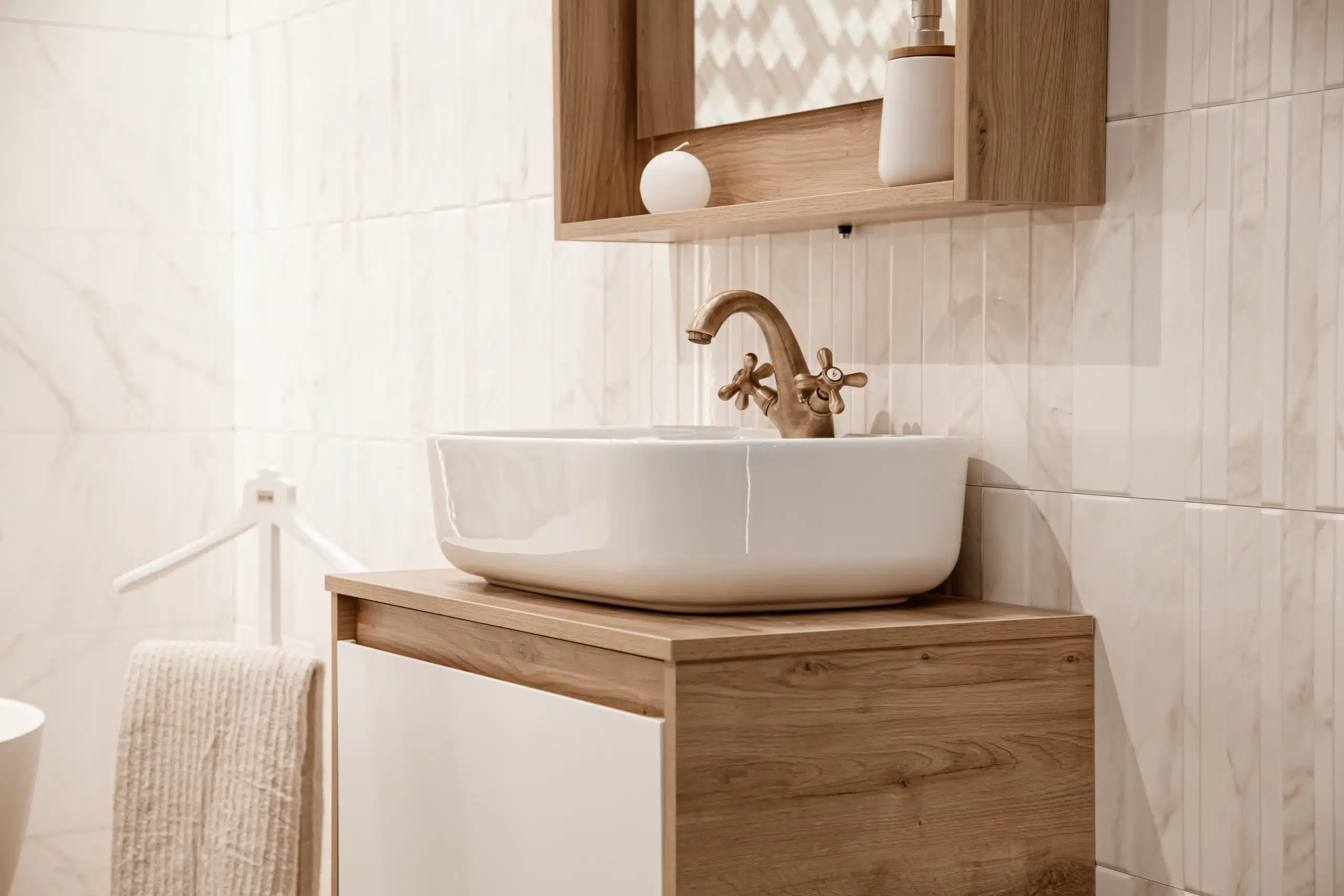 Cozy bathroom interior with a beautiful sink and retro faucet. Close up.