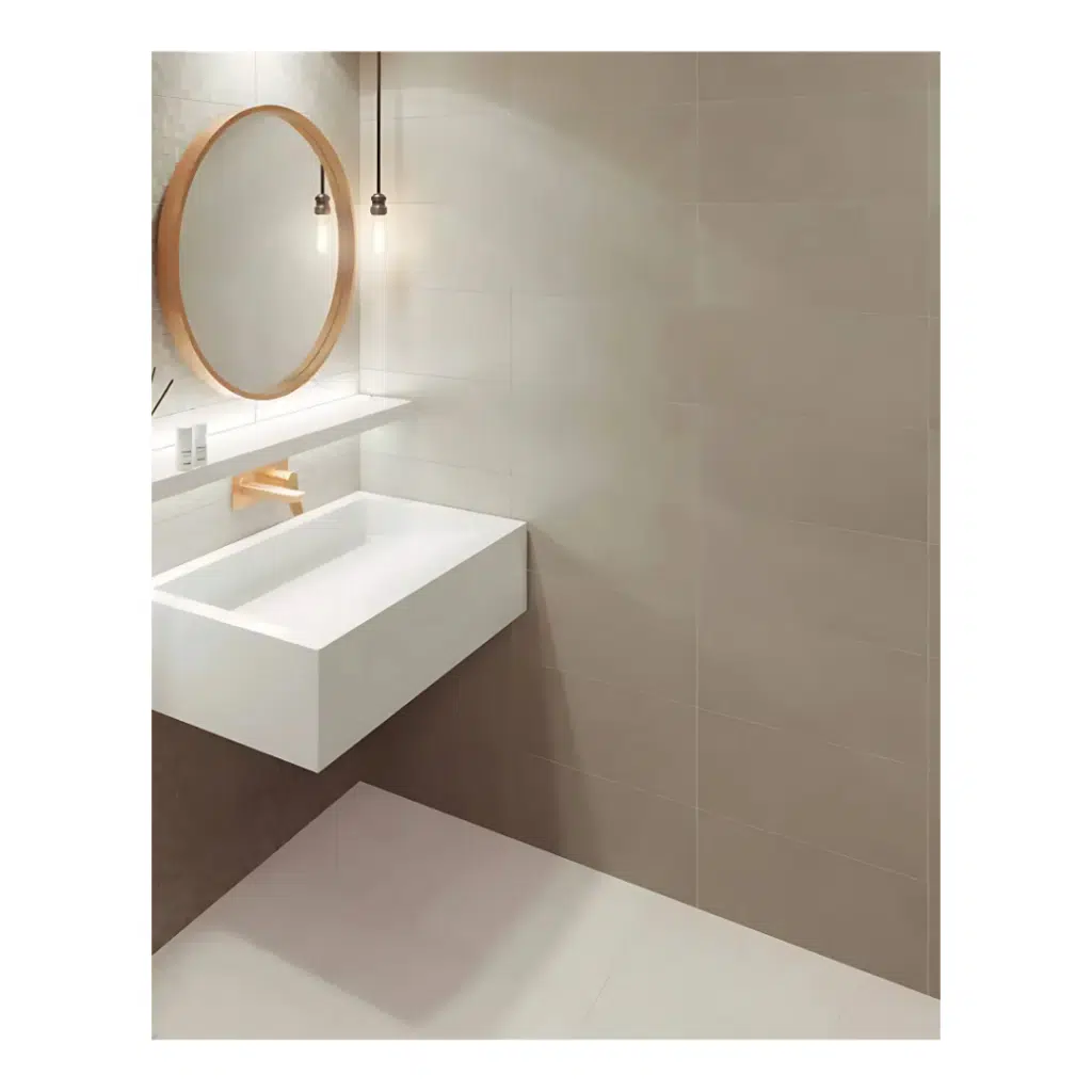A modern stone effect wall tile in white and grey. This ceramic range is suitable for bathrooms, kitchens and many other tiling projects.